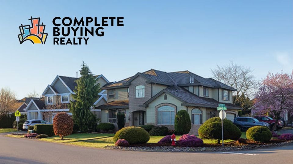 Home in suburbs with Complete Buying Realty logo